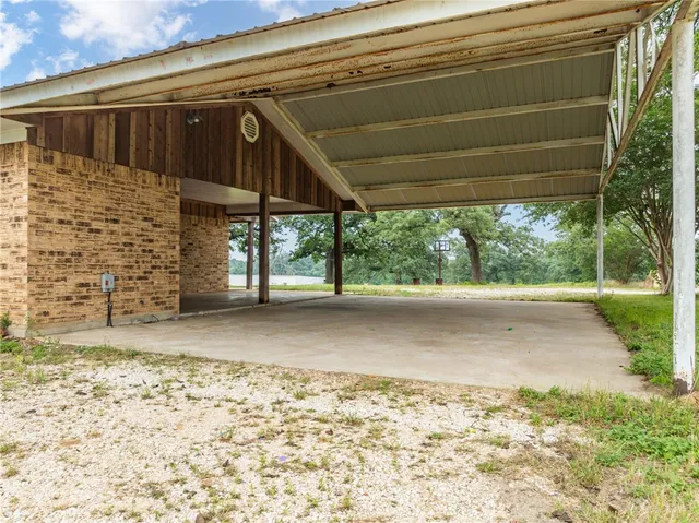 a view of a backyard of the house