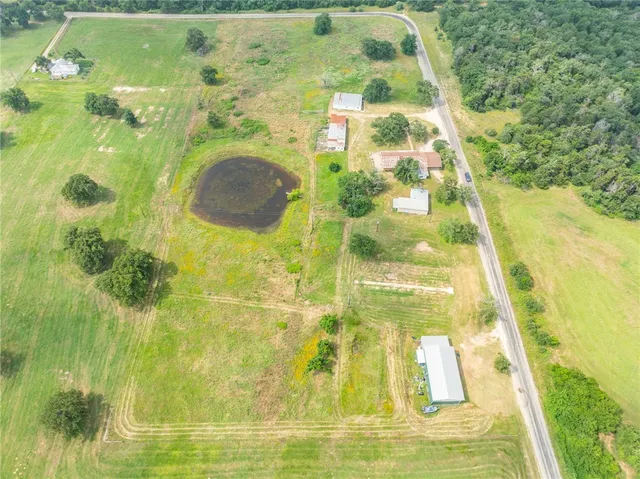 a view of a swimming pool with an outdoor space and seating area