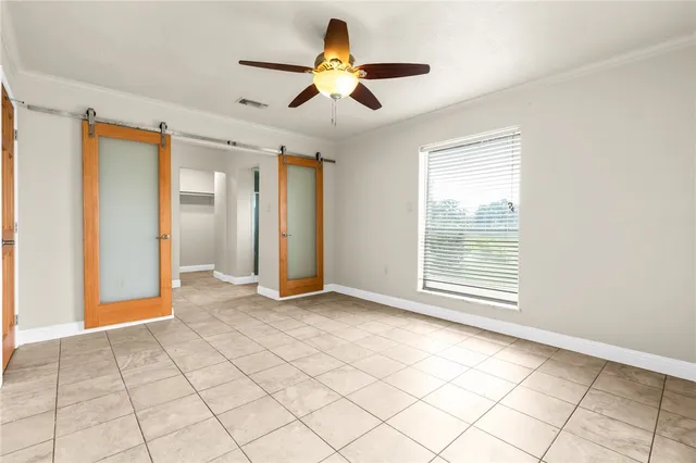 a view of an empty room and window