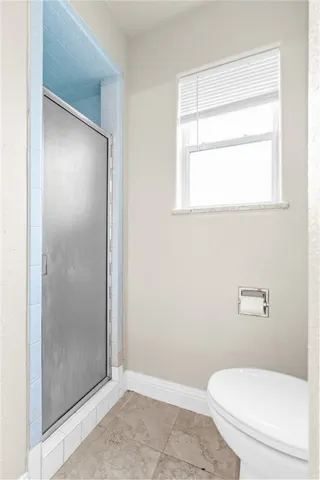 a bathroom with a toilet