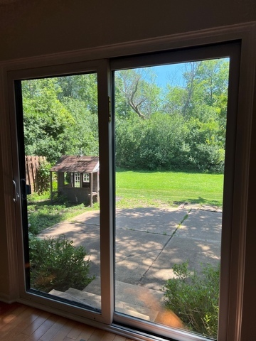 249 Shadow Bend Drive, Unit 249 Wheeling, IL 60090 - Photo 4 of 17 a view of a yard from a balcony