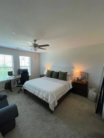 a kitchen with a refrigerator and a sink