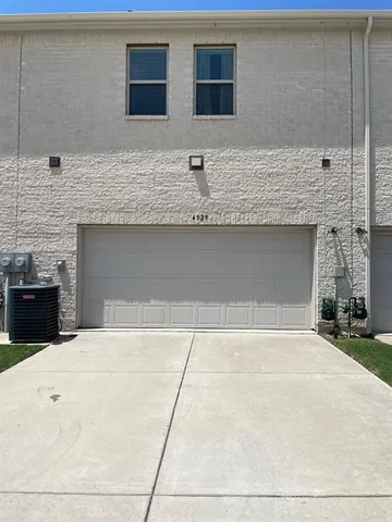 a view of a swimming pool with an outdoor space and seating area