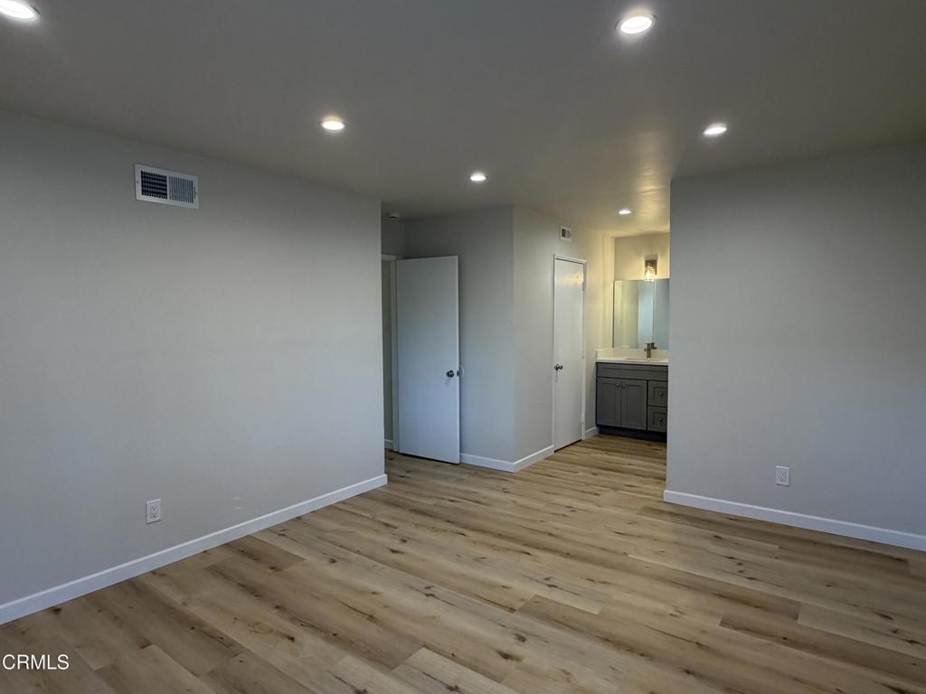 868 Fairview Avenue, Unit A Arcadia, CA 91007 - Photo 11 of 15 a view of an empty room with wooden floor and closet