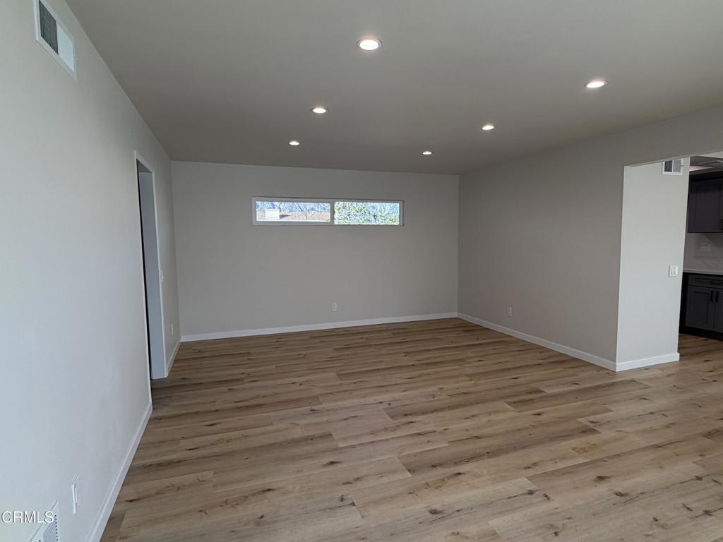 868 Fairview Avenue, Unit A Arcadia, CA 91007 - Photo 3 of 15 a view of empty room with wooden floor