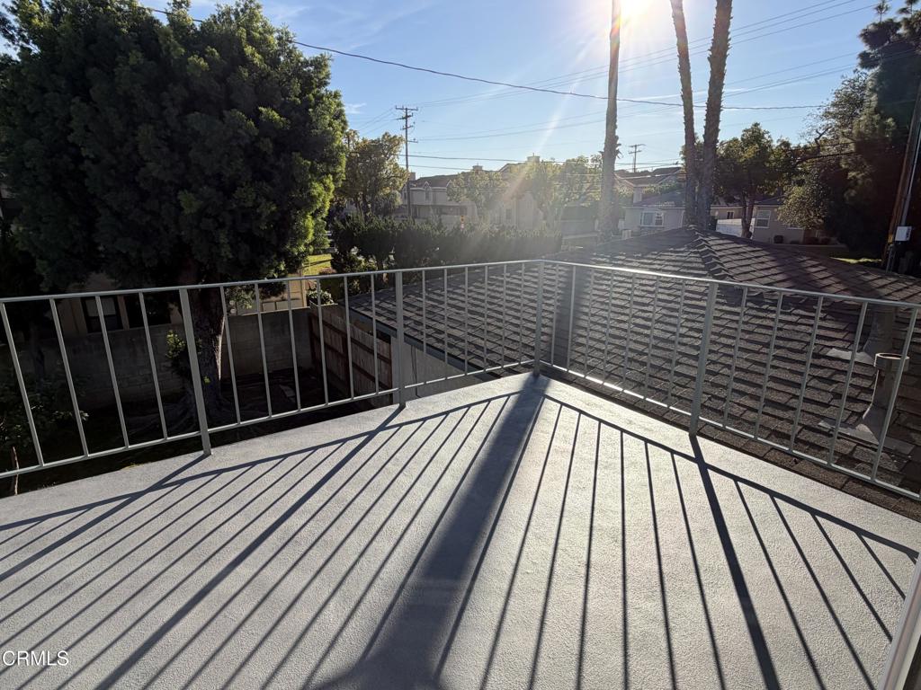 868 Fairview Avenue, Unit A Arcadia, CA 91007 - Photo 5 of 15 a view of balcony with wooden floor and fence