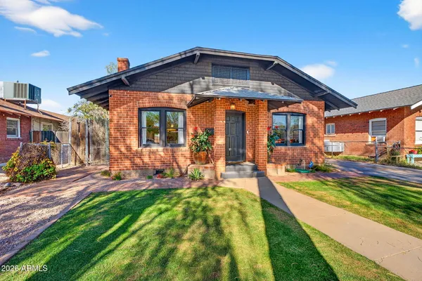 a house with trees in front of it