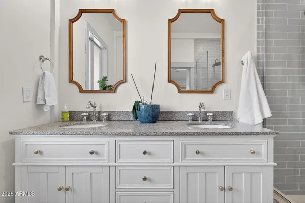 a kitchen with stainless steel appliances a stove a refrigerator and a sink