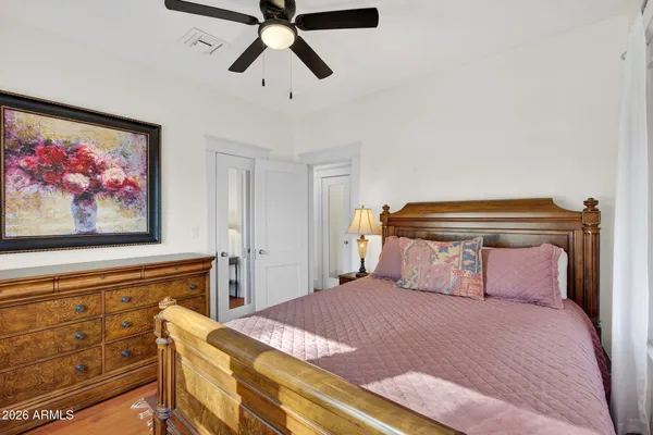 a bathroom with double sink and a mirror