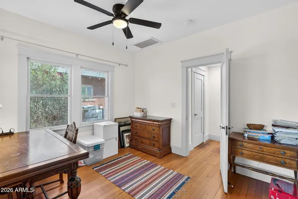 a workspace with furniture and window