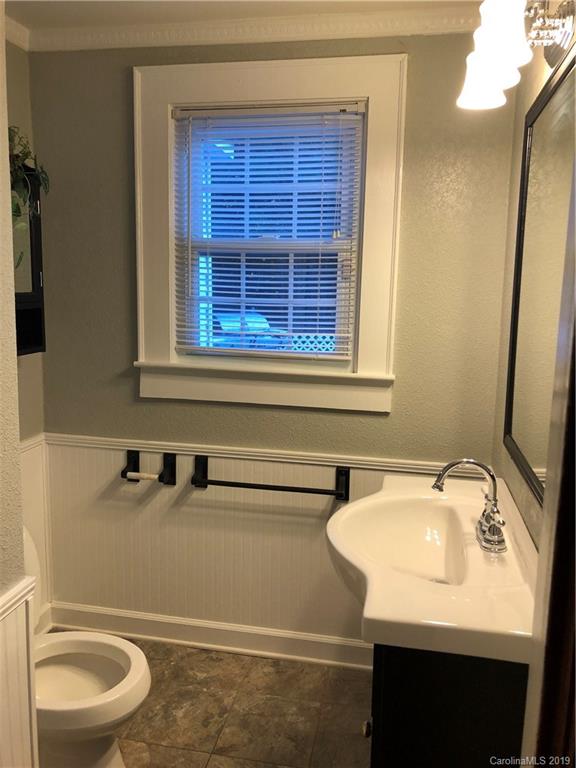726 Valleydale Road Charlotte, NC 28214 - Photo 16 of 32 a bathroom with a sink and a toilet