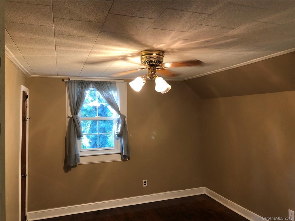 726 Valleydale Road Charlotte, NC 28214 - Photo 17 of 32 a view of a room that has a window in it