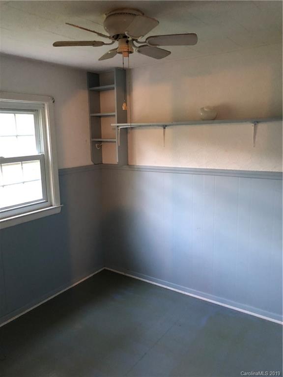 726 Valleydale Road Charlotte, NC 28214 - Photo 18 of 32 an empty room with a empty space and a window