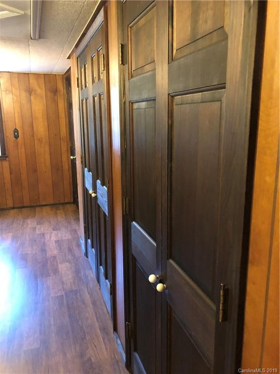 726 Valleydale Road Charlotte, NC 28214 - Photo 21 of 32 a view of a hallway with wooden floor