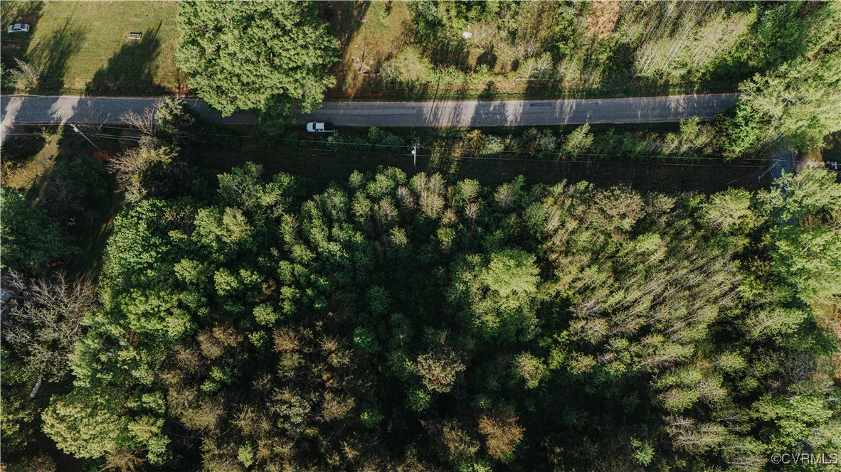 0 Jenkins Church Road Cumberland, VA 23040 - Photo 6 of 16 an aerial view of a house with a yard and large trees