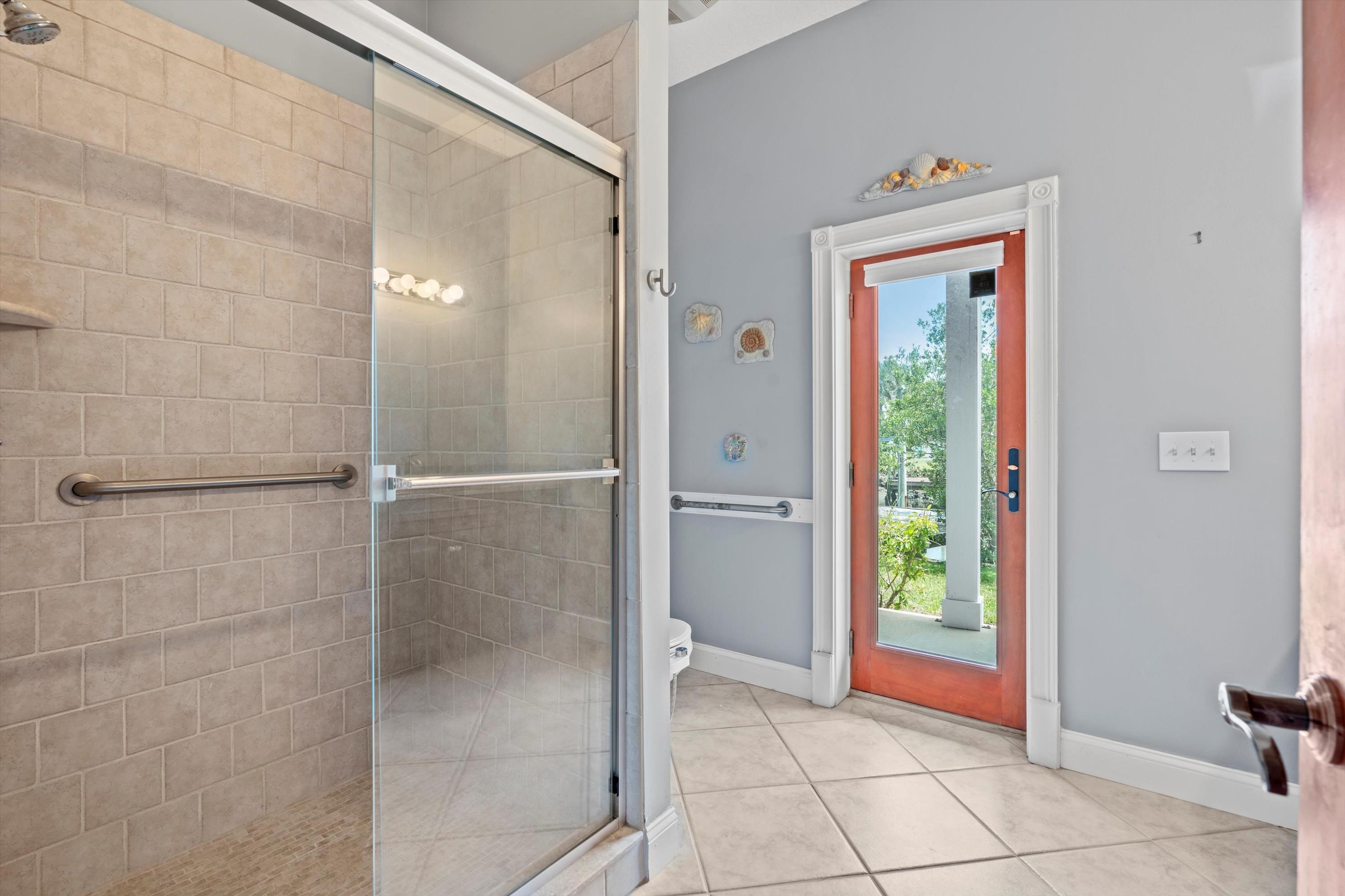 231 Barrataria Drive St. Augustine, FL 32080 - Photo 16 of 43 a bathroom with a shower