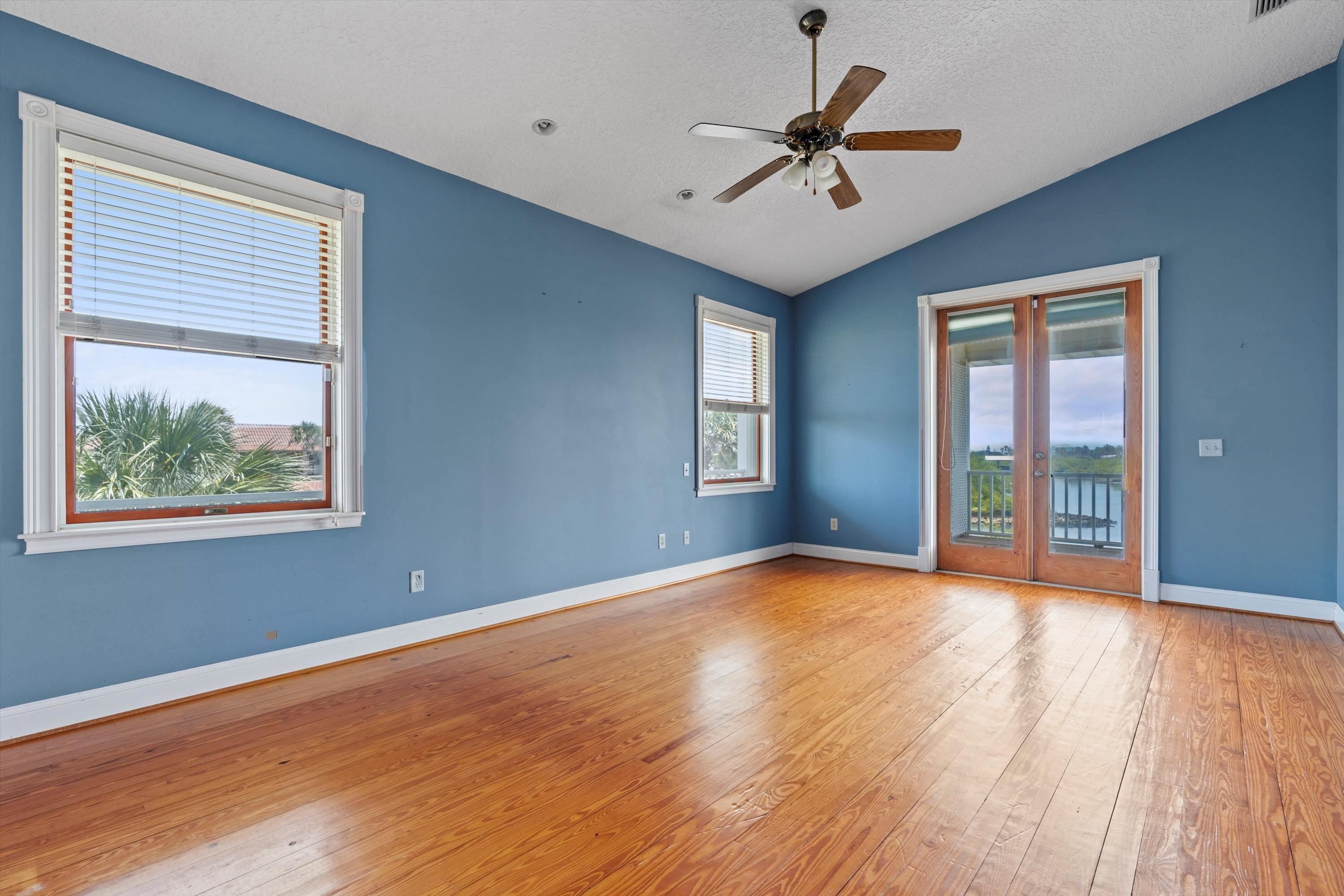 231 Barrataria Drive St. Augustine, FL 32080 - Photo 24 of 43 a view of room with window ceiling fan and hardwood floor