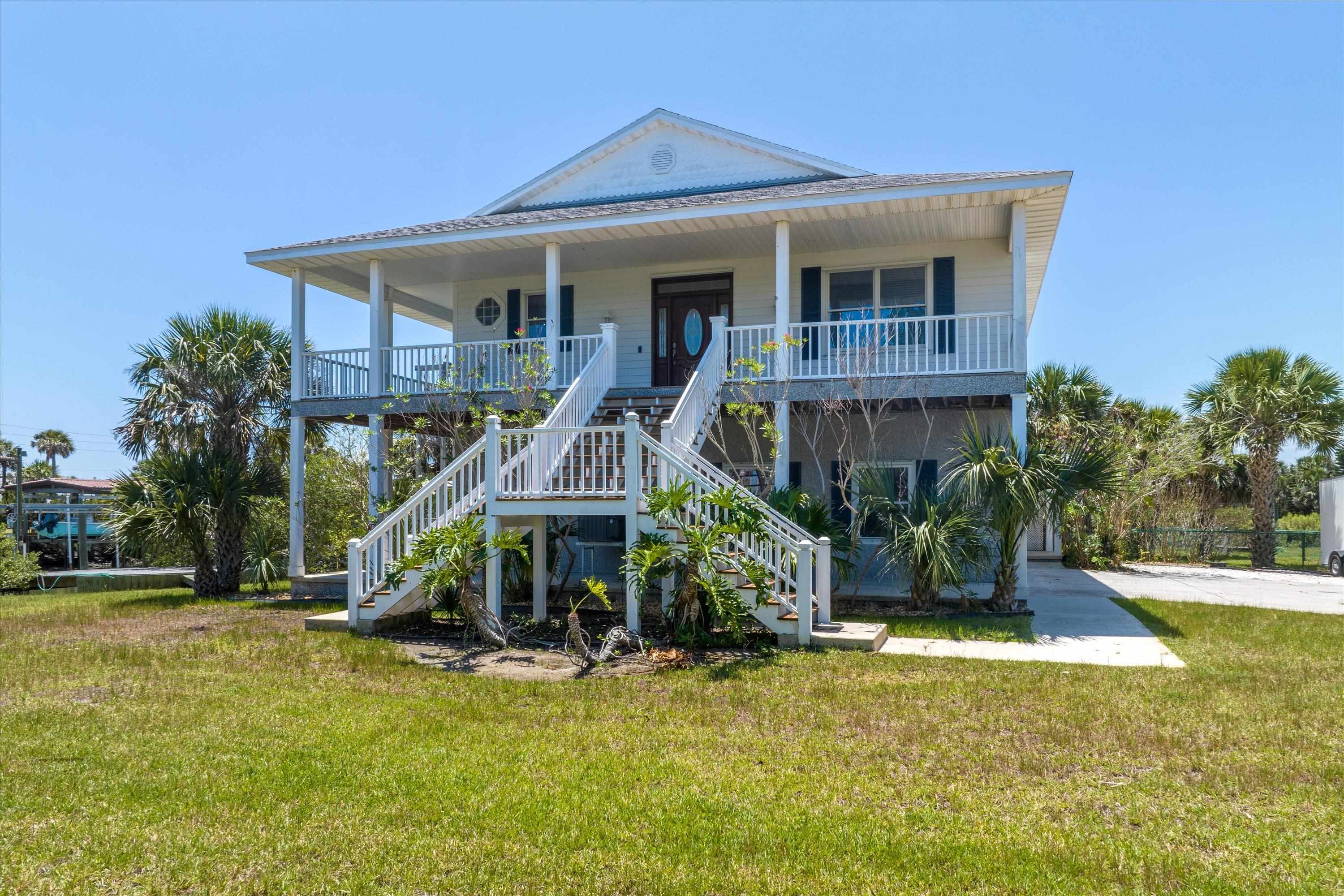 231 Barrataria Drive St. Augustine, FL 32080 - Photo 40 of 43 a view of a house with swimming pool and porch
