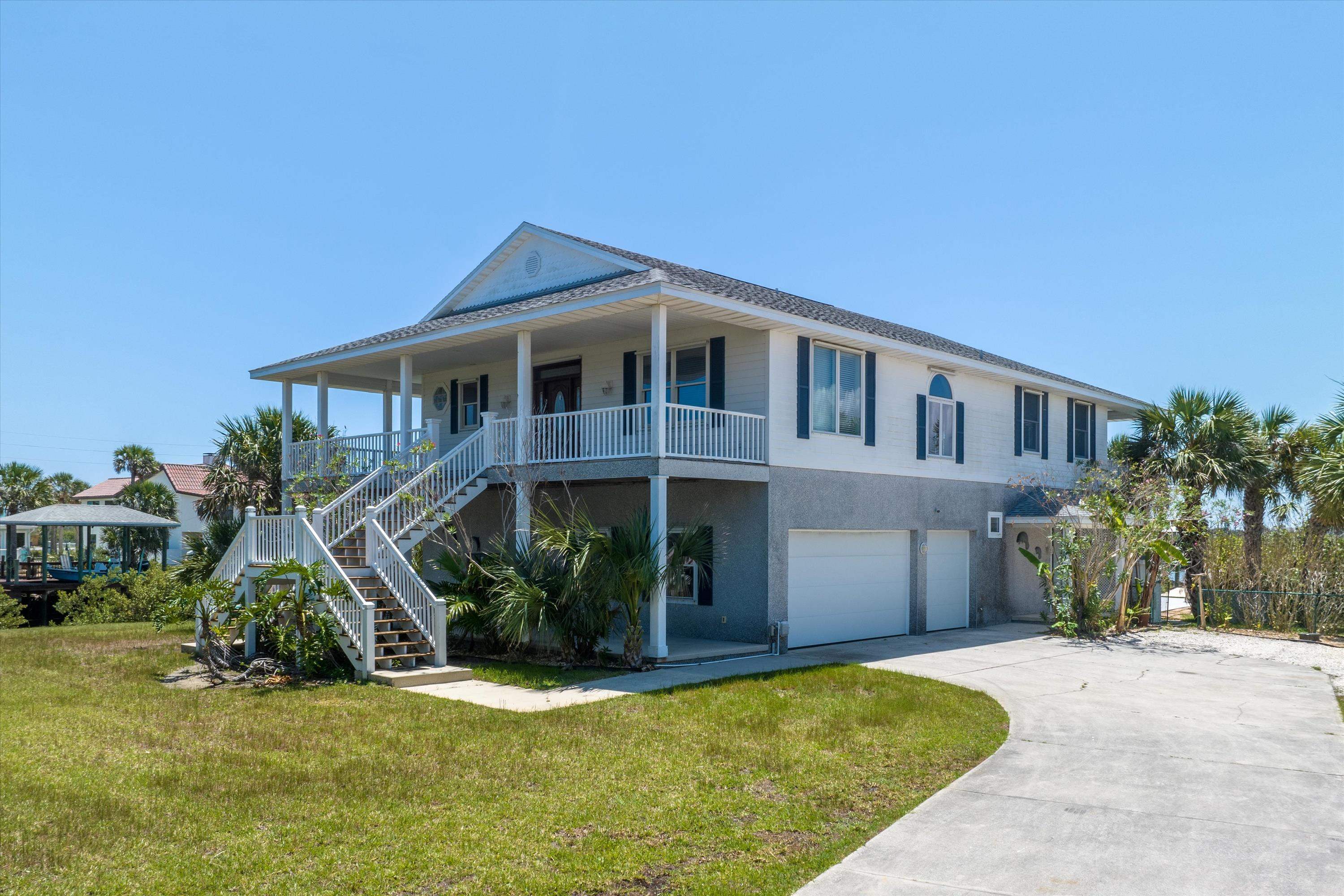 231 Barrataria Drive St. Augustine, FL 32080 - Photo 42 of 43 a front view of a house with a yard
