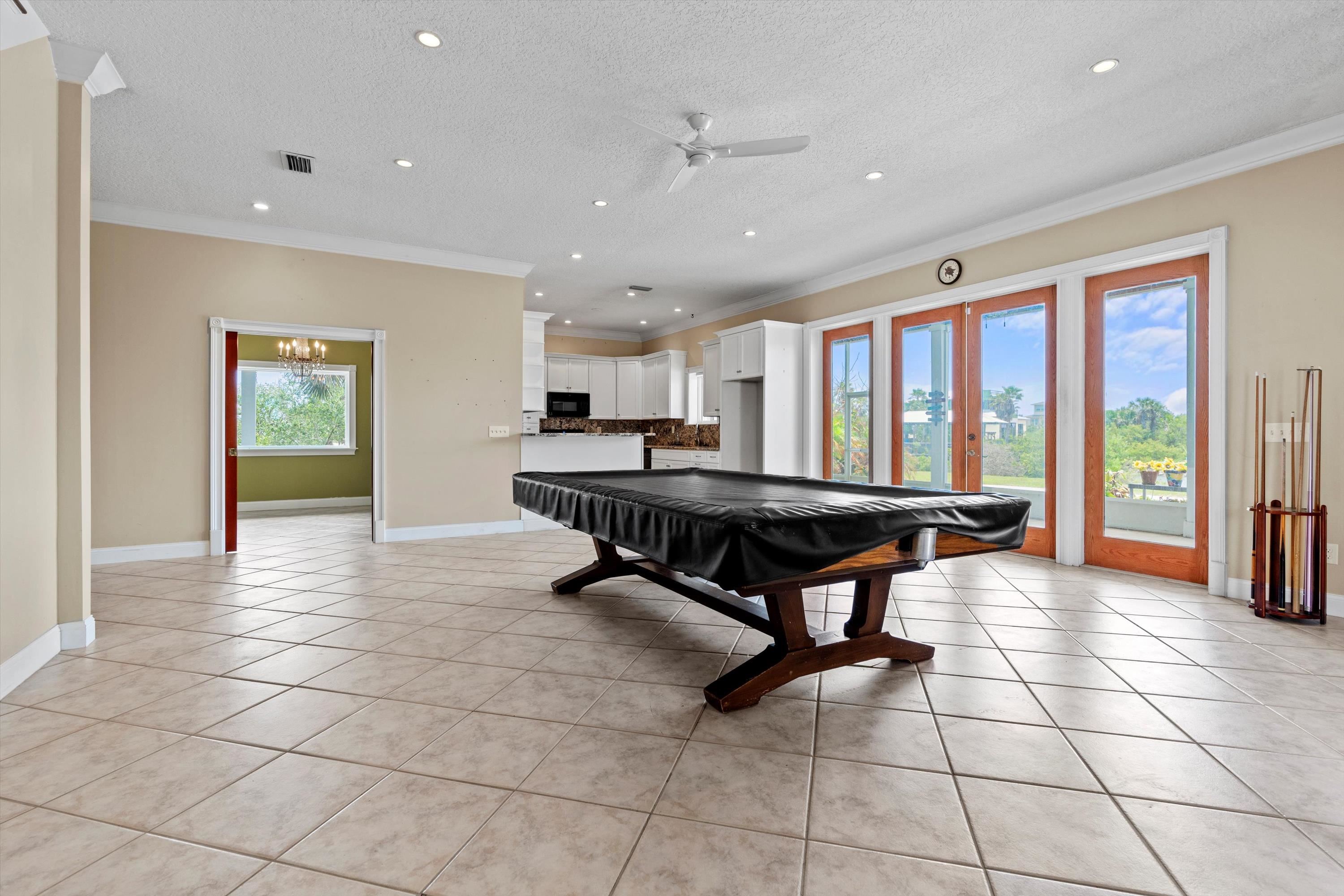 231 Barrataria Drive St. Augustine, FL 32080 - Photo 9 of 43 a room with furniture and large windows