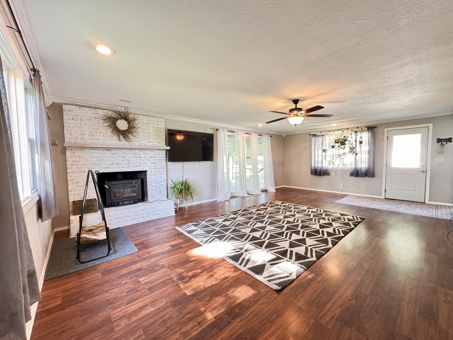 1087 Lost Nation Road Dixon, IL 61021 - Photo 3 of 23 a living room with furniture and a fireplace