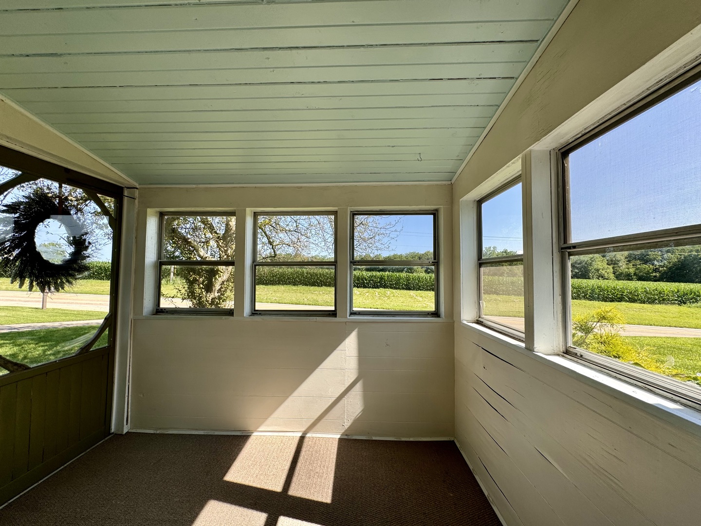 1087 Lost Nation Road Dixon, IL 61021 - Photo 9 of 23 a view of a room with window & wooden floor