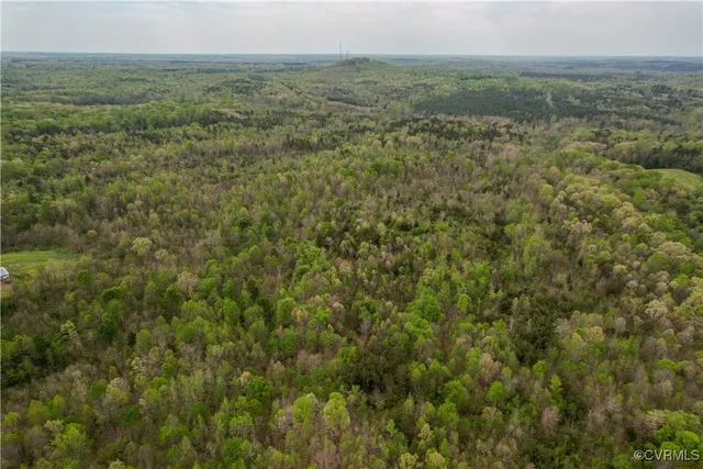 a view of a field with an outdoor space