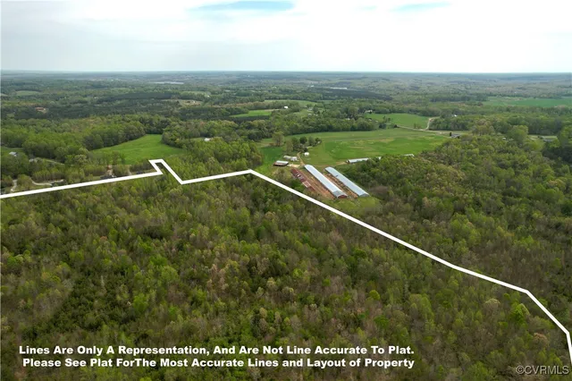 a view of a field with an ocean view