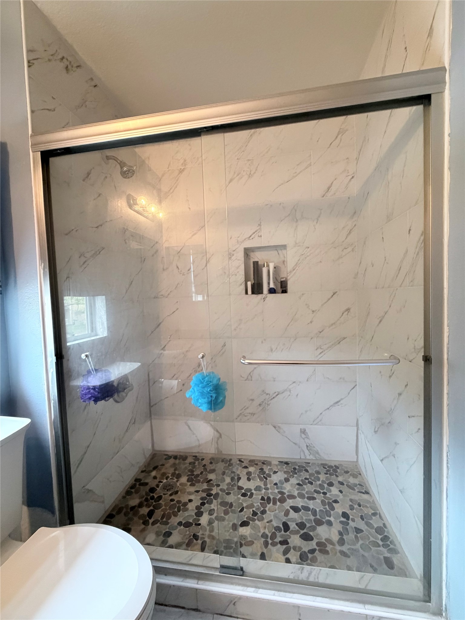 23614 Wildwood Green Way Spring, TX 77373 - Photo 16 of 27 a bathroom with a sink and a shower