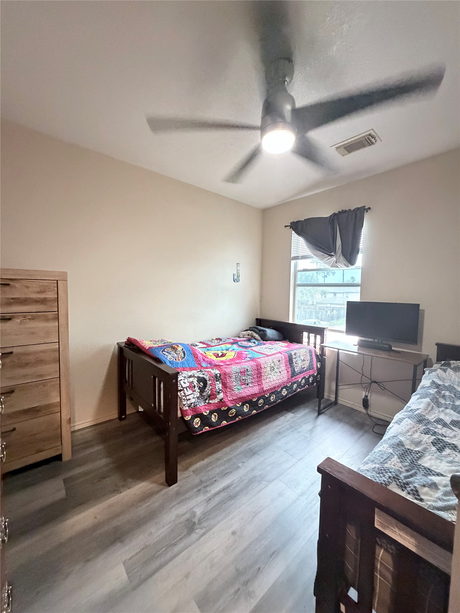 23614 Wildwood Green Way Spring, TX 77373 - Photo 19 of 27 a bedroom with furniture and window
