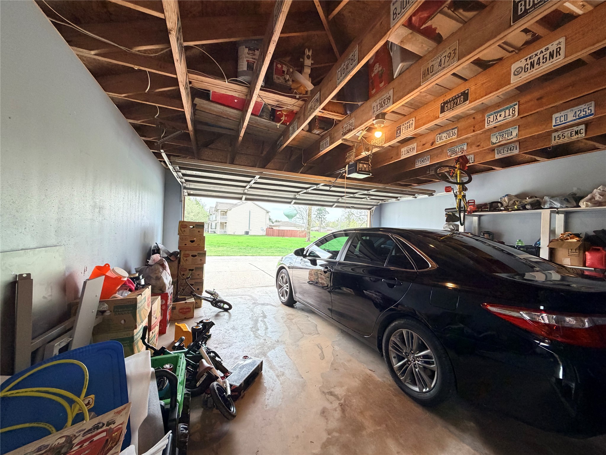 23614 Wildwood Green Way Spring, TX 77373 - Photo 24 of 27 a car that is parked in a garage