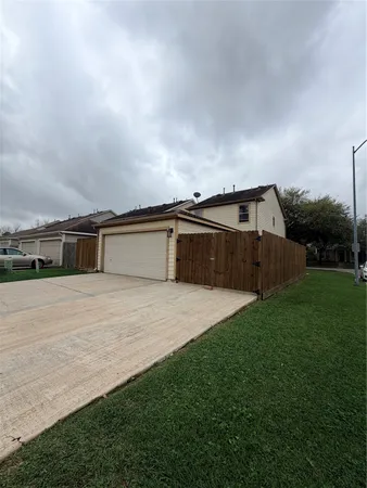 a blue bench sitting in front of a house