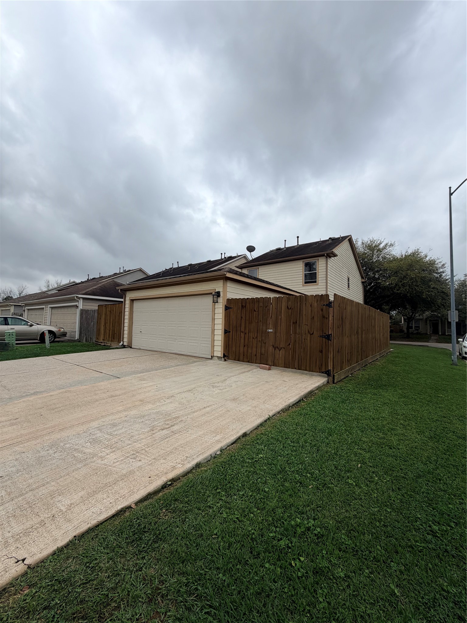 23614 Wildwood Green Way Spring, TX 77373 - Photo 25 of 27 a front view of a house with a yard