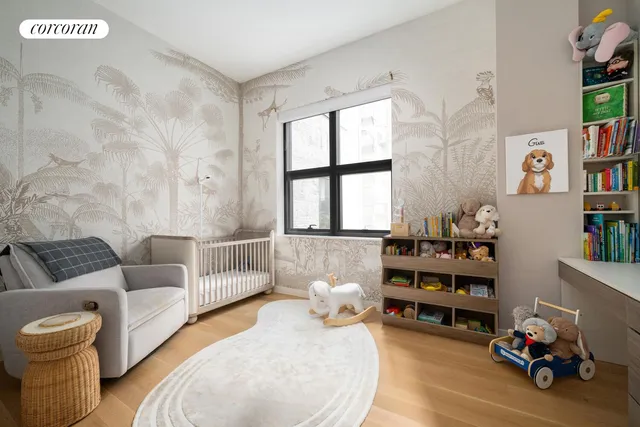 a bedroom with furniture and a book shelf
