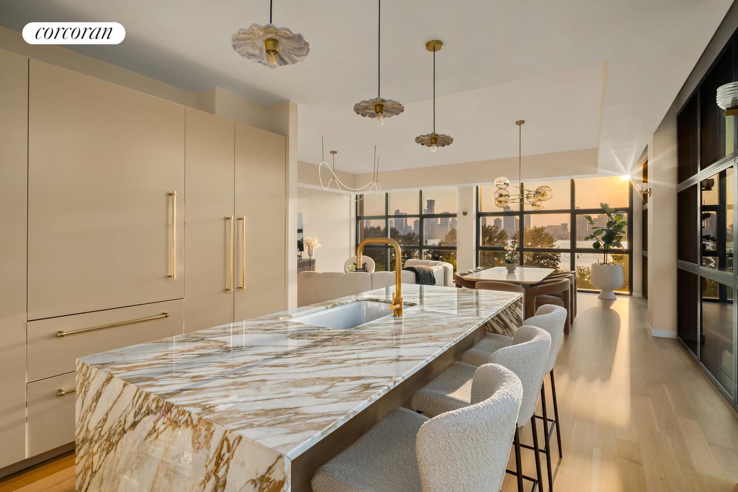 290 West Street, Unit 3A Manhattan, NY 10013 - Photo 5 of 21 a dining room with stainless steel appliances granite countertop a stove a kitchen island with chairs and wooden floor