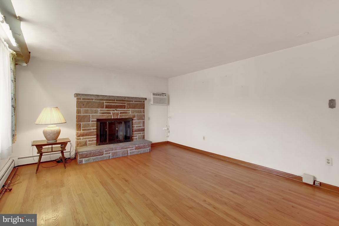 4089 Steltz Road New Freedom, PA 17349 - Photo 2 of 26 Living room with Stone Fireplace