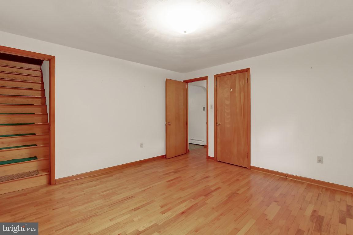 4089 Steltz Road New Freedom, PA 17349 - Photo 11 of 26 Bedroom 2 with attic stairway