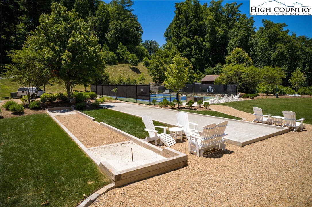 13 August Lily Lane Boone, NC 28607 - Photo 26 of 29 a view of a swimming pool with a patio and a yard