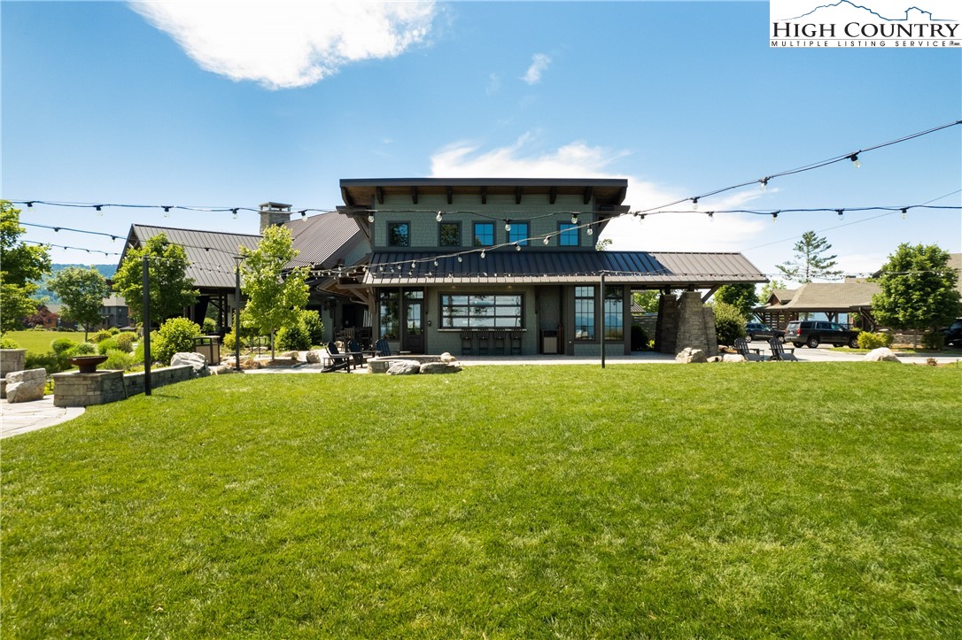 13 August Lily Lane Boone, NC 28607 - Photo 10 of 29 a front view of a house with a yard