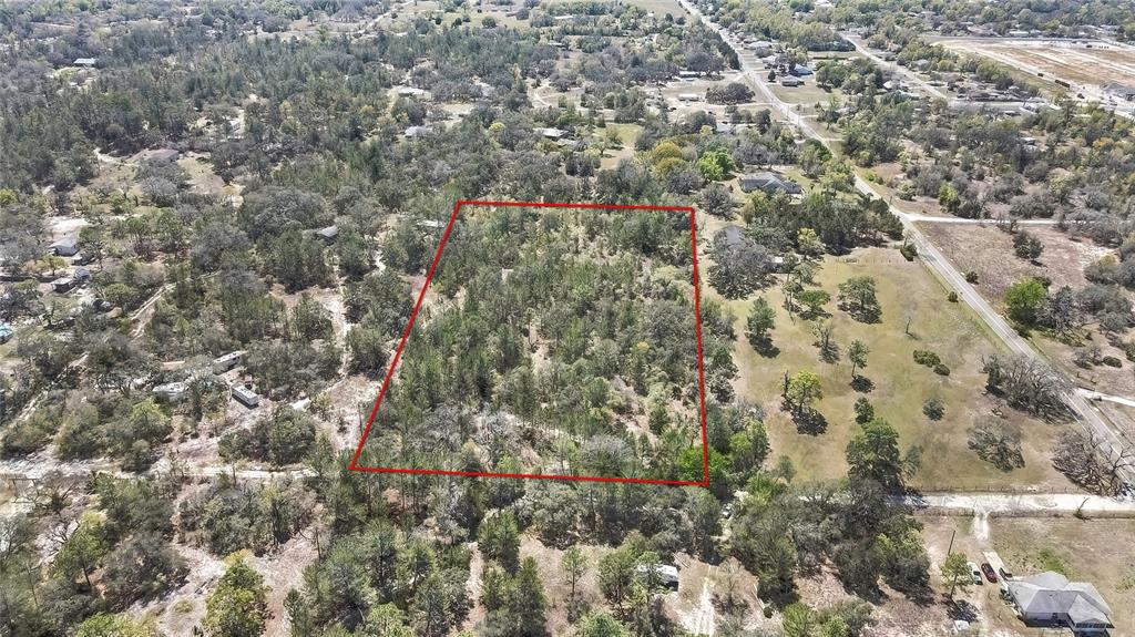 12460 Taylor Street Brooksville, FL 34613 - Photo 3 of 3 a view of a city and mountain