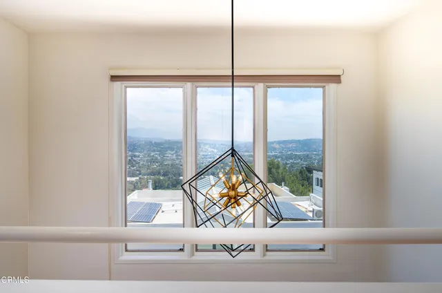 a view of a living room and a window