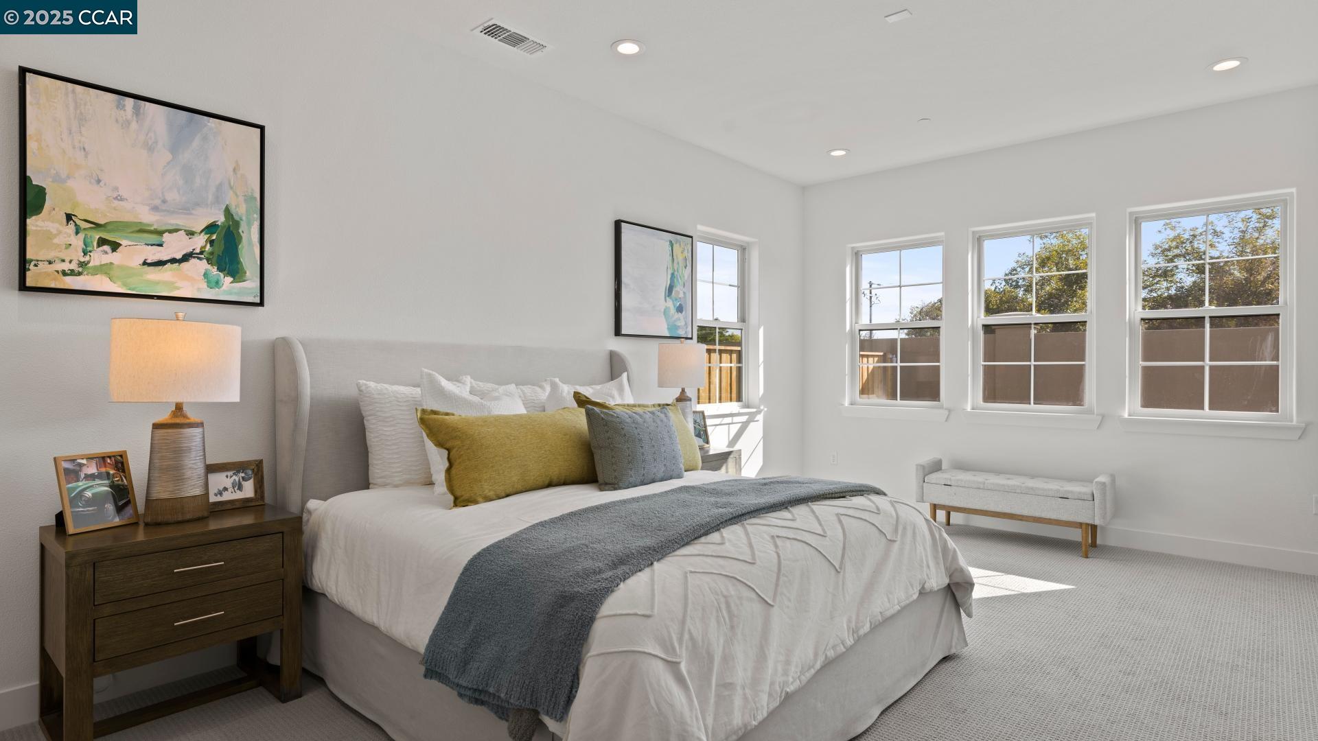 1634 Granite Place Tracy, CA 95377 - Photo 4 of 28 a bedroom with a bed and a large window