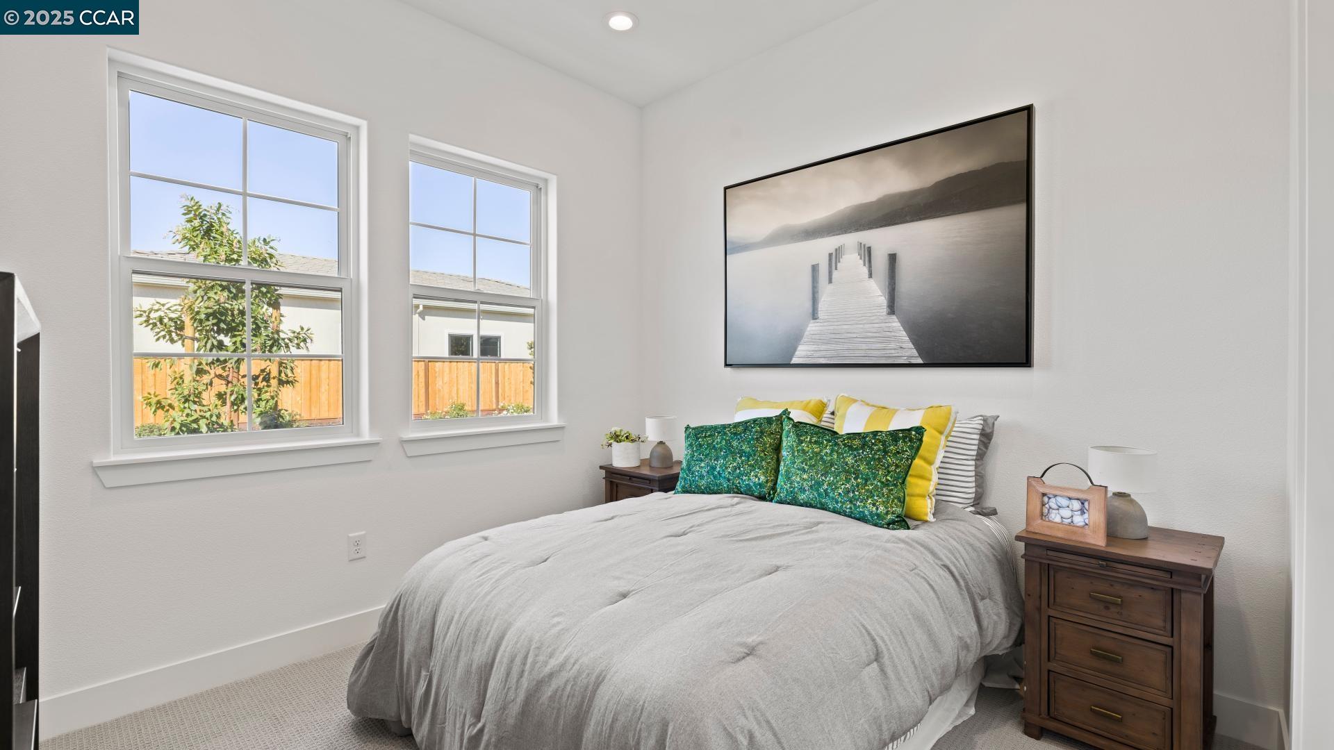 1634 Granite Place Tracy, CA 95377 - Photo 6 of 28 a bedroom with a bed and a window