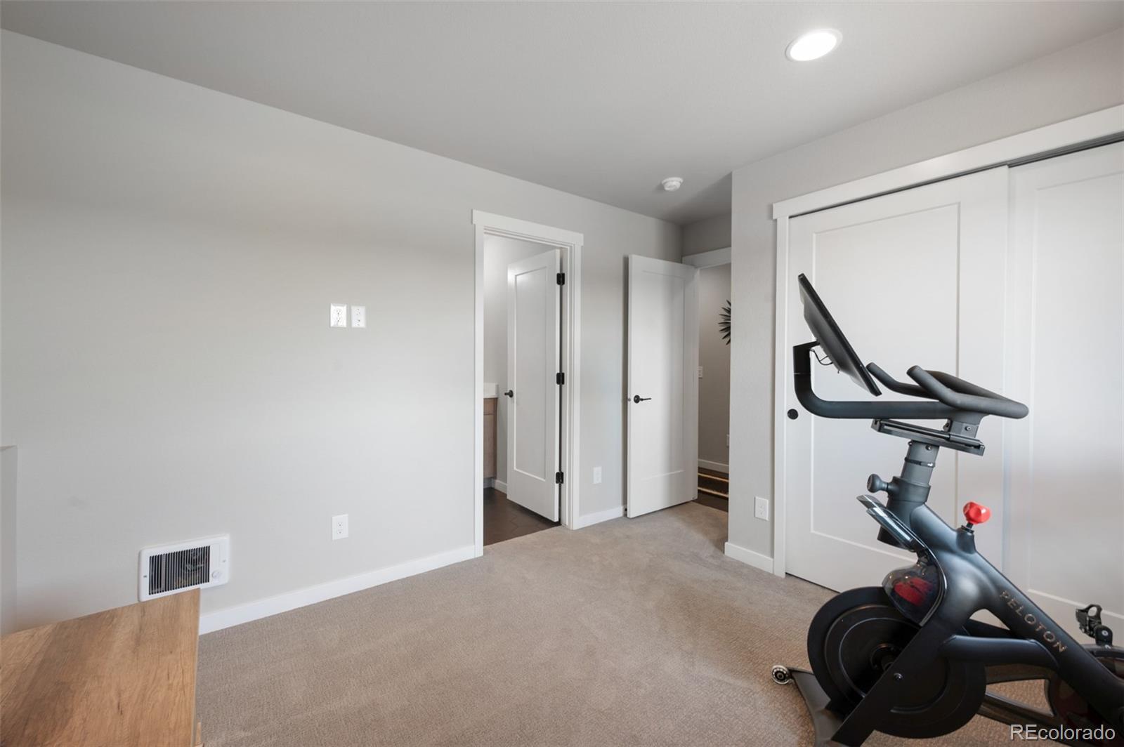3563 Mission Bay Court Colorado Springs, CO 80922 - Photo 17 of 48 a view of a room with gym equipment