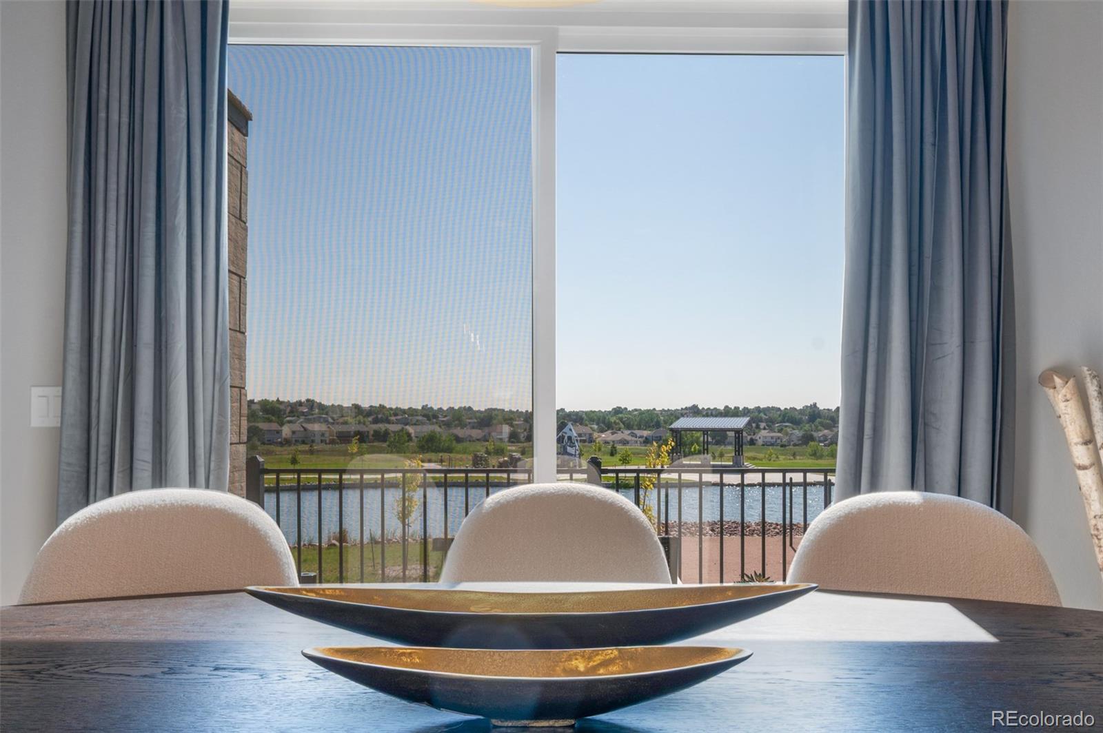3563 Mission Bay Court Colorado Springs, CO 80922 - Photo 33 of 48 a view of a chair in front of a window