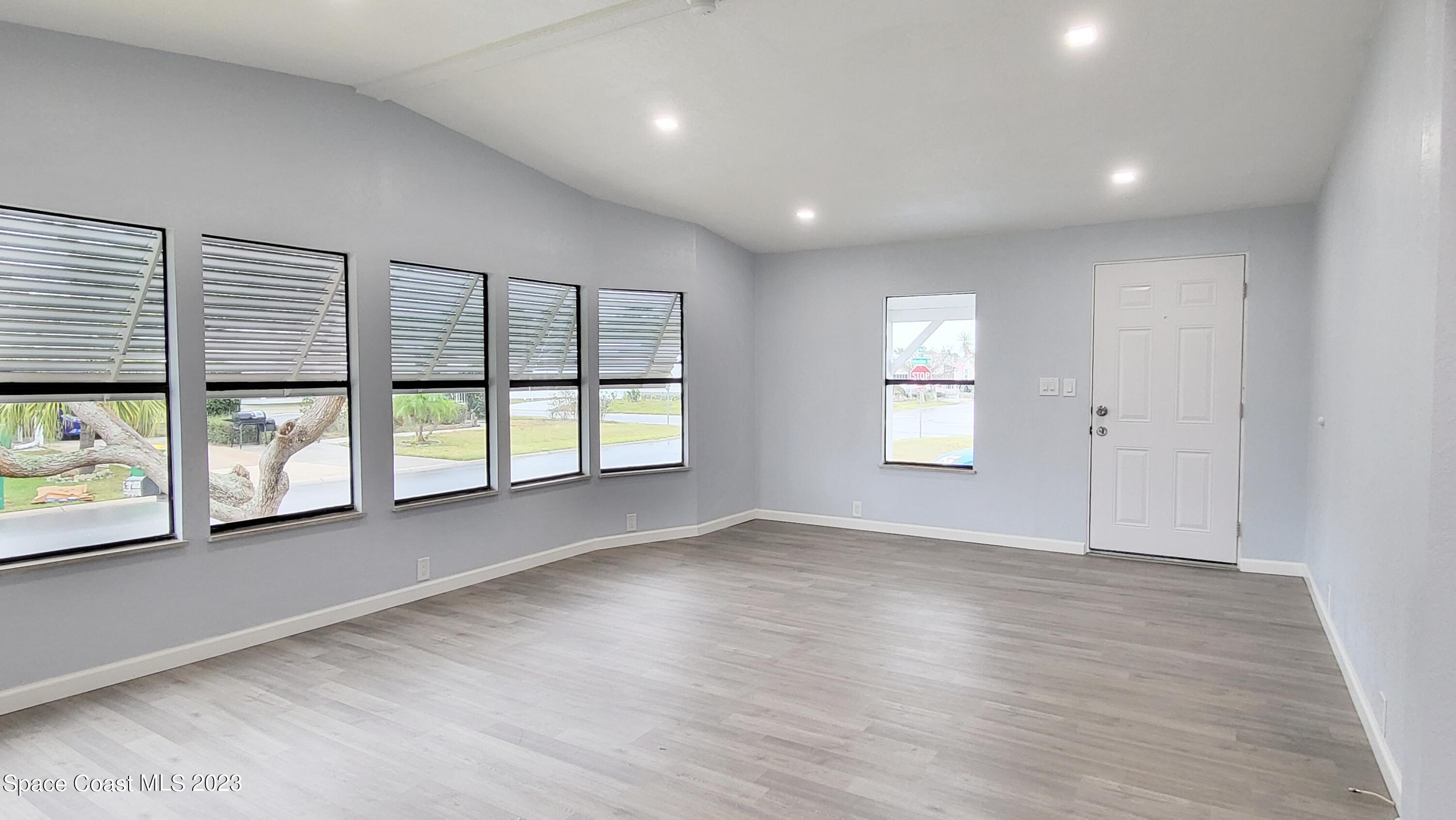 313 Kiwi Drive Sebastian, FL 32976 - Photo 6 of 31 an empty room with windows