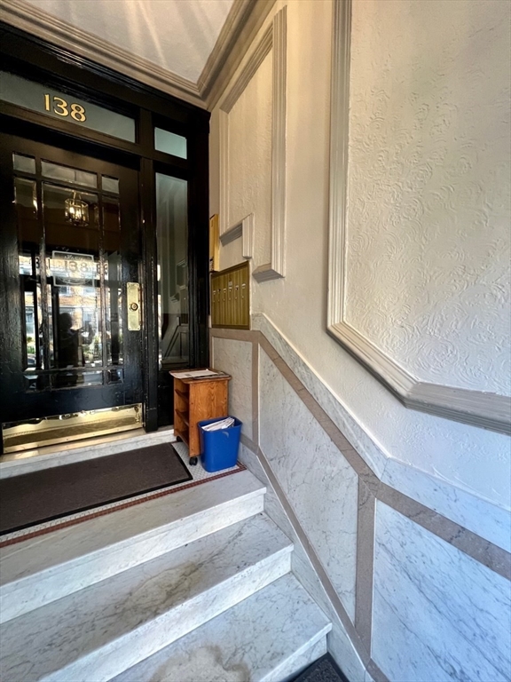 138 Fuller Street, Unit 3 Brookline, MA 02446 - Photo 24 of 27 a bathroom with a bathtub and window