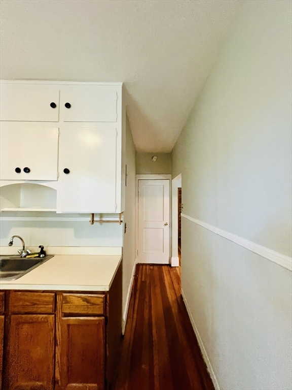 138 Fuller Street, Unit 3 Brookline, MA 02446 - Photo 7 of 27 a bathroom with a sink and a mirror