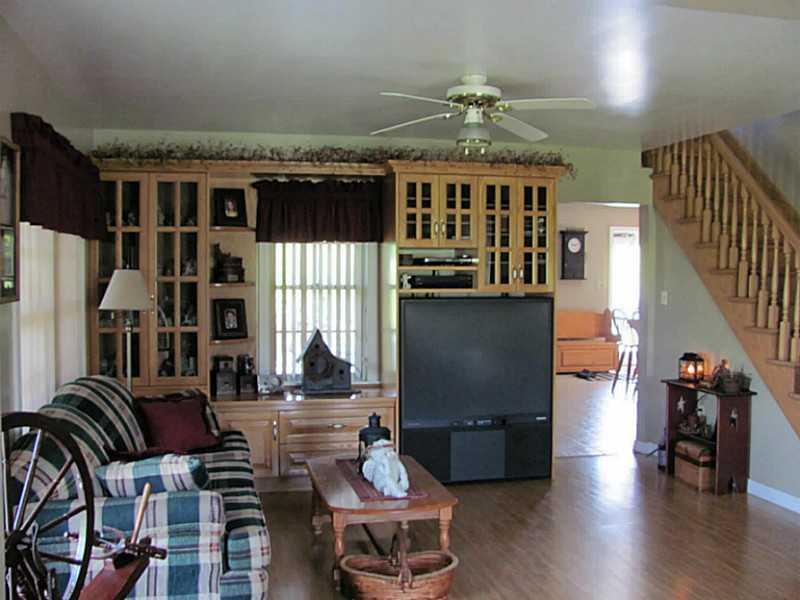 596 New Canada Road New Canada, ME 04743 - Photo 30 of 35 Living Room.