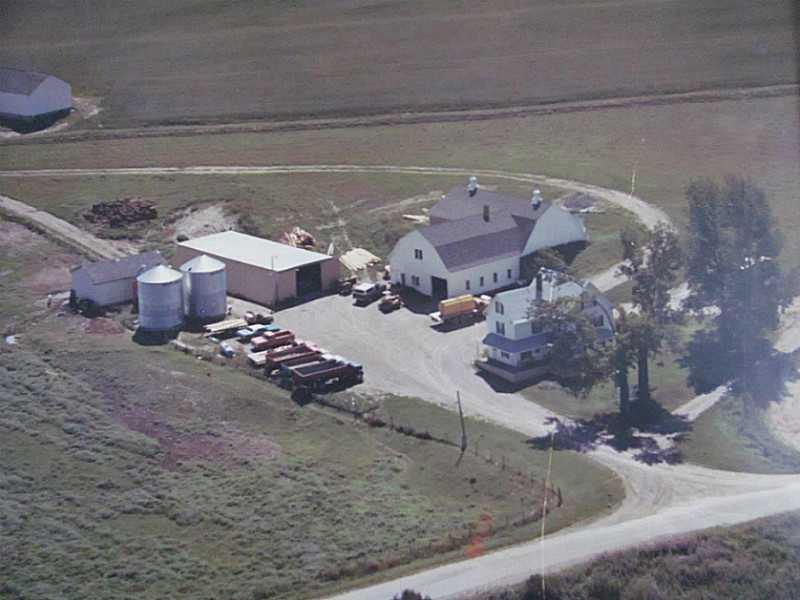 596 New Canada Road New Canada, ME 04743 - Photo 5 of 35 Aerial View. View of the farm in the...